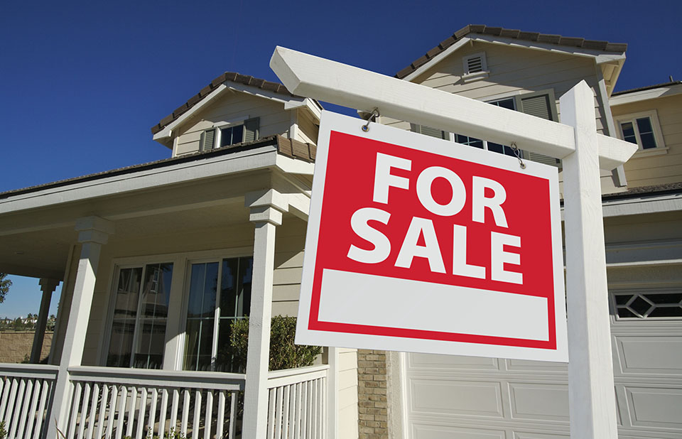 Sold Home For Sale Sign & New House